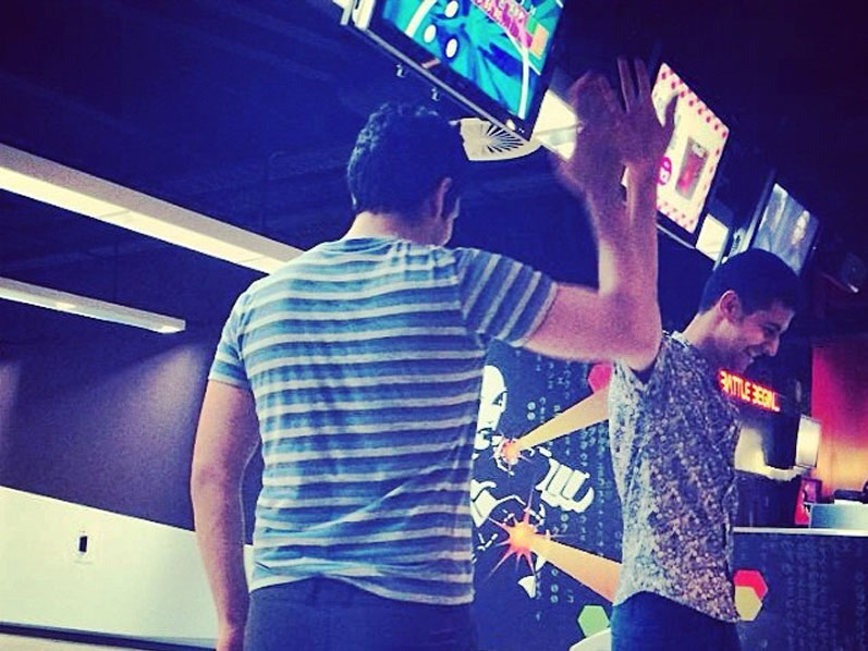 High fives at the bowling alley