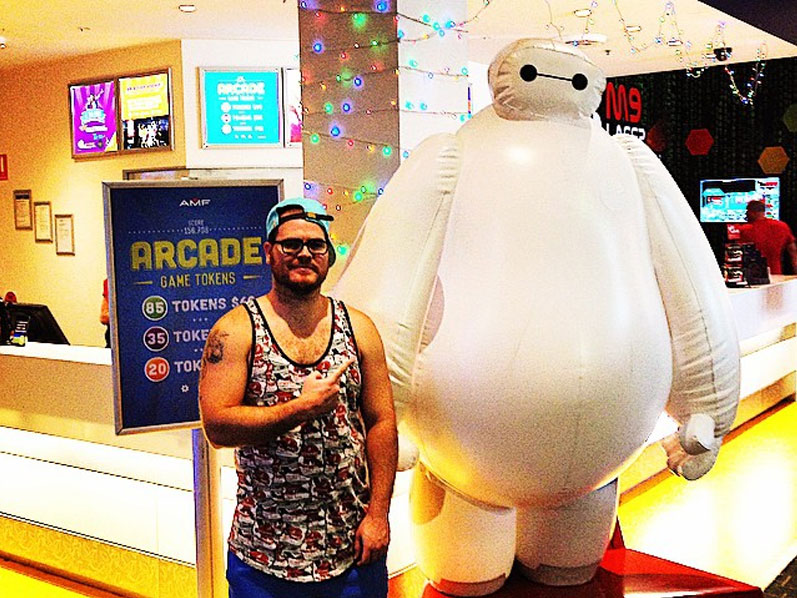 Guy with Baymax from Big Hero 6