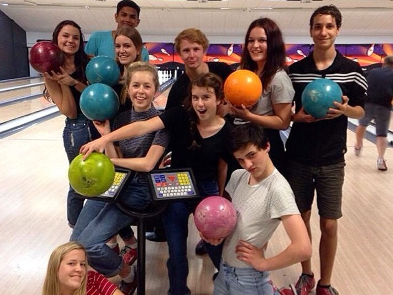 Group of teens at the bowling alley
