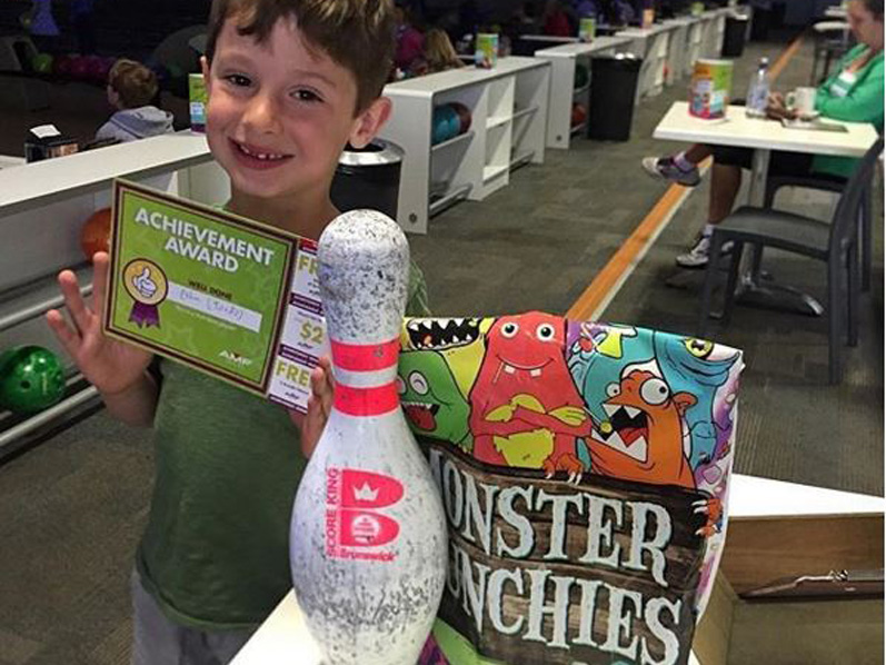 Youngster with his Achievement Award