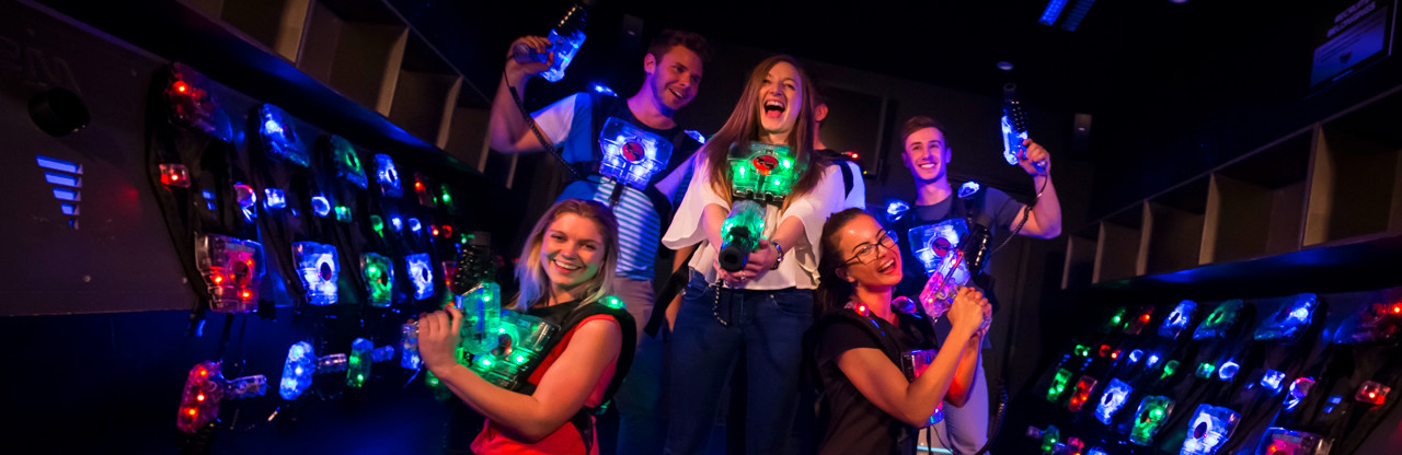 Adults playing laser skirmish